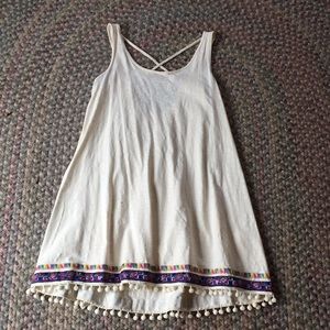 white dress Pom Pom with designs